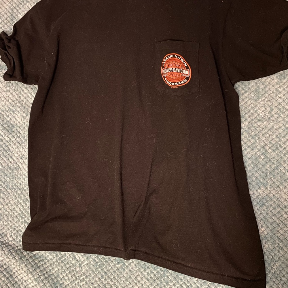 XL Harley Davidson tee shirt with front pocket. Black, used, normal wear.